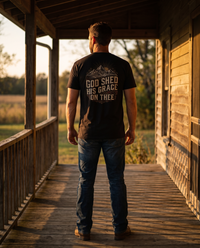 Man seen from behind wearing the tee: engraved mountains, sun and plain over GOD SHED HIS GRACE ON THEE &mdash; view 1