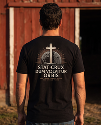 Man seen from behind wearing a tee with a cross on an engraved globe over Stat Crux Dum Volvitur Orbis back print &mdash; view 1