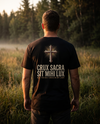 Man seen from behind in a tee whose back print shows an ornate radiant cross over CRUX SACRA SIT MIHI LUX &mdash; view 1